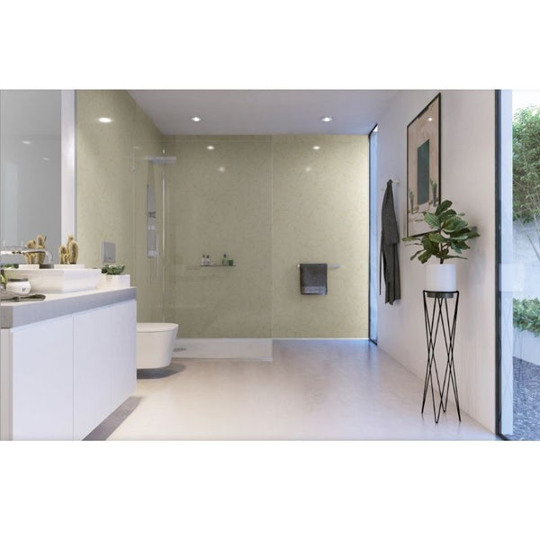 Modern bathroom interior with glass shower, white vanity, wall-mounted toilet, decorative plant, wall mirror, and LED lighting.