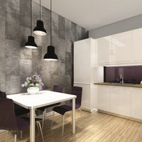 Modern kitchen interior with pendant lights, white dining table, purple chairs, wooden floor, textured grey accent wall, white cabinetry, and sleek countertop.