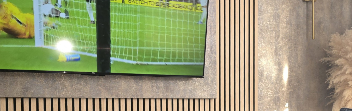 Create Your Perfect Match-Day Media Wall with STRIVO Slat Panels