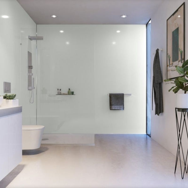 Modern minimalist bathroom interior with walk-in shower, glass partition, white walls, floating vanity, recessed lighting, and contemporary decor elements.