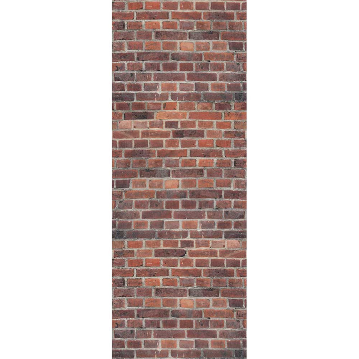 Red brick wall texture with varying shades of bricks and visible mortar joints in vertical layout