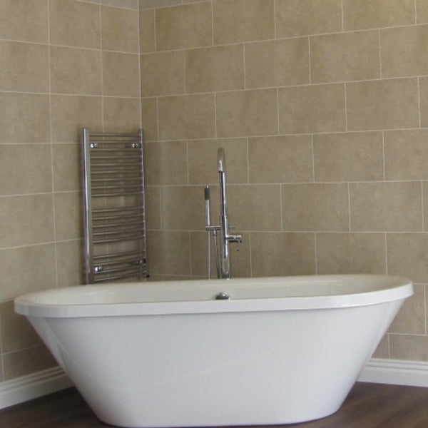 Modern bathroom interior with free-standing oval bathtub, beige tiled walls, stainless steel towel warmer, and wall-mounted faucet