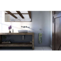 Modern bathroom interior with rustic wooden vanity, vessel sink, large mirror, exposed wood beams, and decorative plants.