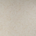 Close-up of beige marble texture with intricate veins and patterns for background or design.